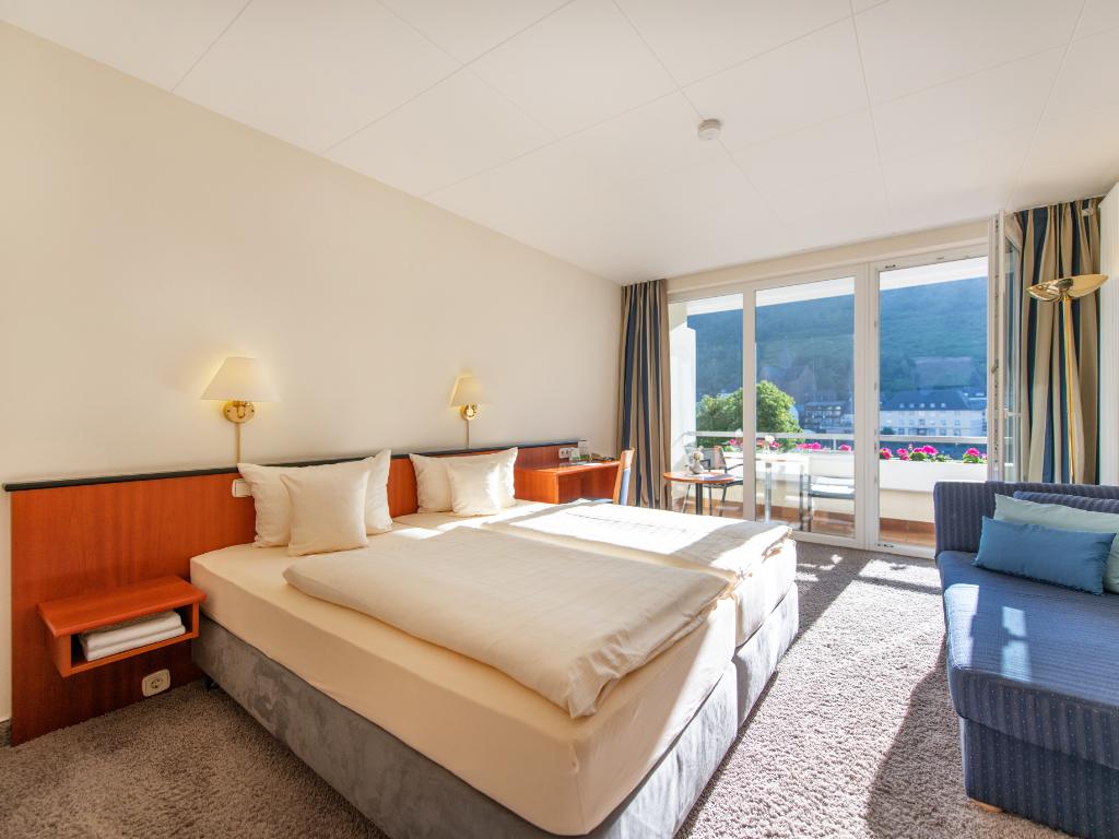 double room with balcony facing the river