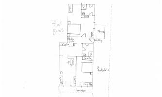 A hand-drawn floor plan of an apartment. The rooms are labeled, including kitchen, living room, and terrace.