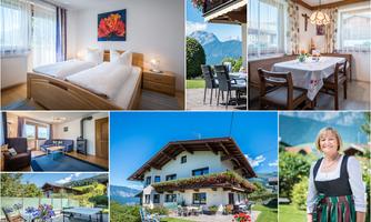 Inviting accommodation with modern rooms and a beautiful view of the mountains. The surroundings provide a pleasant atmosphere and cozy outdoor seating.