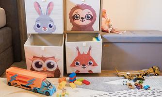 A colorful children's room with several storage boxes representing animals. Various toys and building blocks are scattered around the boxes.