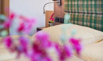 Komfortzimmer-Deluxe Abendsonne-Bett-Tirolerhof-68