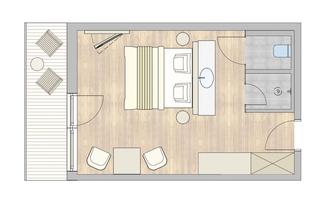 A room layout with a sleeping area, a bathroom, and a terrace. The floor is made of wood and there are cozy furnishings.