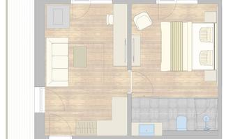 A modern living space layout with one bedroom and a living area. The room has a bright floor and simple furniture.