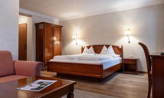 Charming room with stylish cherry wood (“Kirsche”) furniture