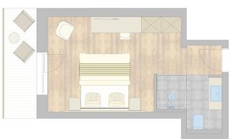 A clear floor plan drawing of a room with a double bed, a seating area, and a bathroom. The light wood and gray tiled floors give the room a pleasant atmosphere.