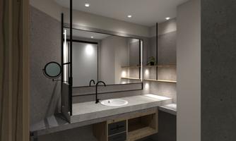 A modern bathroom with a large mirror surface and stylish fixtures. The walls and surfaces are in neutral tones.
