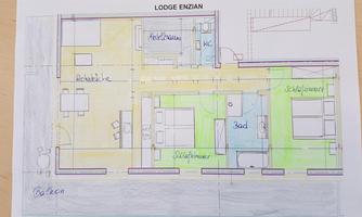 A floor plan of the Lodge Enzian showing various rooms such as living and bedrooms. The drawing is colorfully marked and clearly structured.