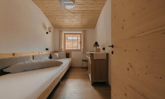 Pine room with separate beds