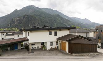 A modern house with a reserved parking space in the carport for our guests.