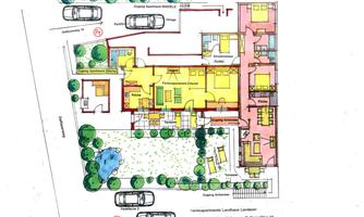 A site plan of a building with various rooms and external parking spaces. Green areas and trees are also marked.
