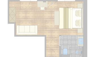 A schematic representation of a living space with a bedroom and a bathroom. The room contains a bed, a couch, and a table.