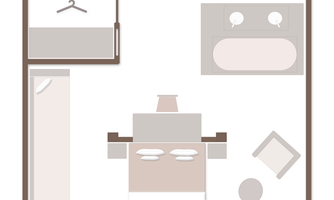 A simple floor plan diagram of a room. It shows a bed, a table, and a shower.