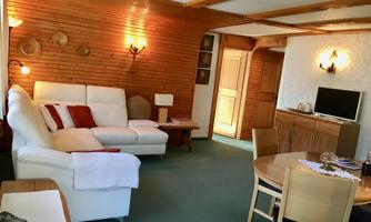 Jochum_Appartements_Wildschoenau_Balk_WZ_Eingang