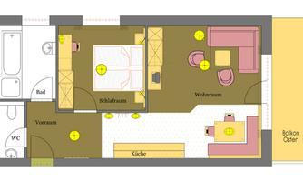 A functional floor plan drawing of an apartment. It shows the bedroom, living room, kitchen, and bathroom.