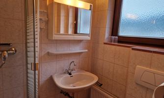 Bathroom with shower and WC