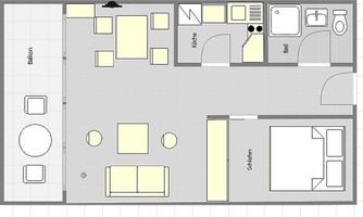 A simple floor plan drawing of an apartment. It shows a kitchen, a living room, a bathroom, and two bedrooms.