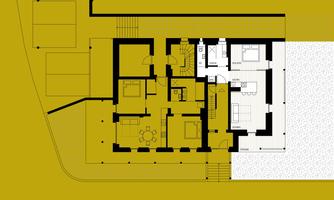 A floor plan of a house with several rooms. The layout shows living and bedrooms, as well as a kitchen and a dining area.