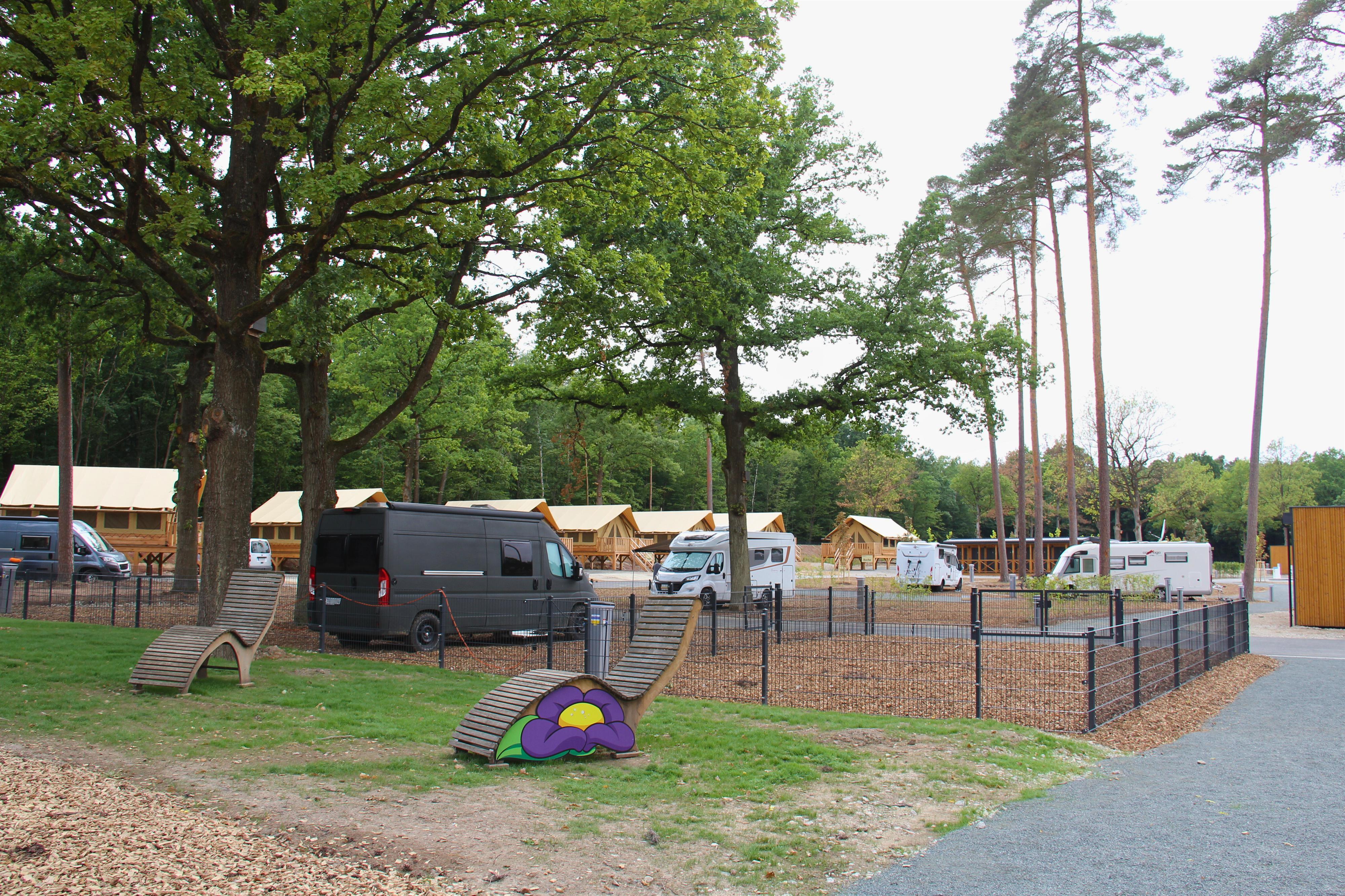 Exclusive parking space with dog fence