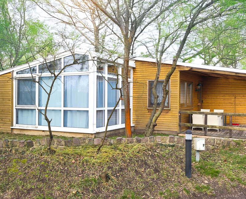 Ferienhaus mit Seeblick und Wintergarten für 4 Personen