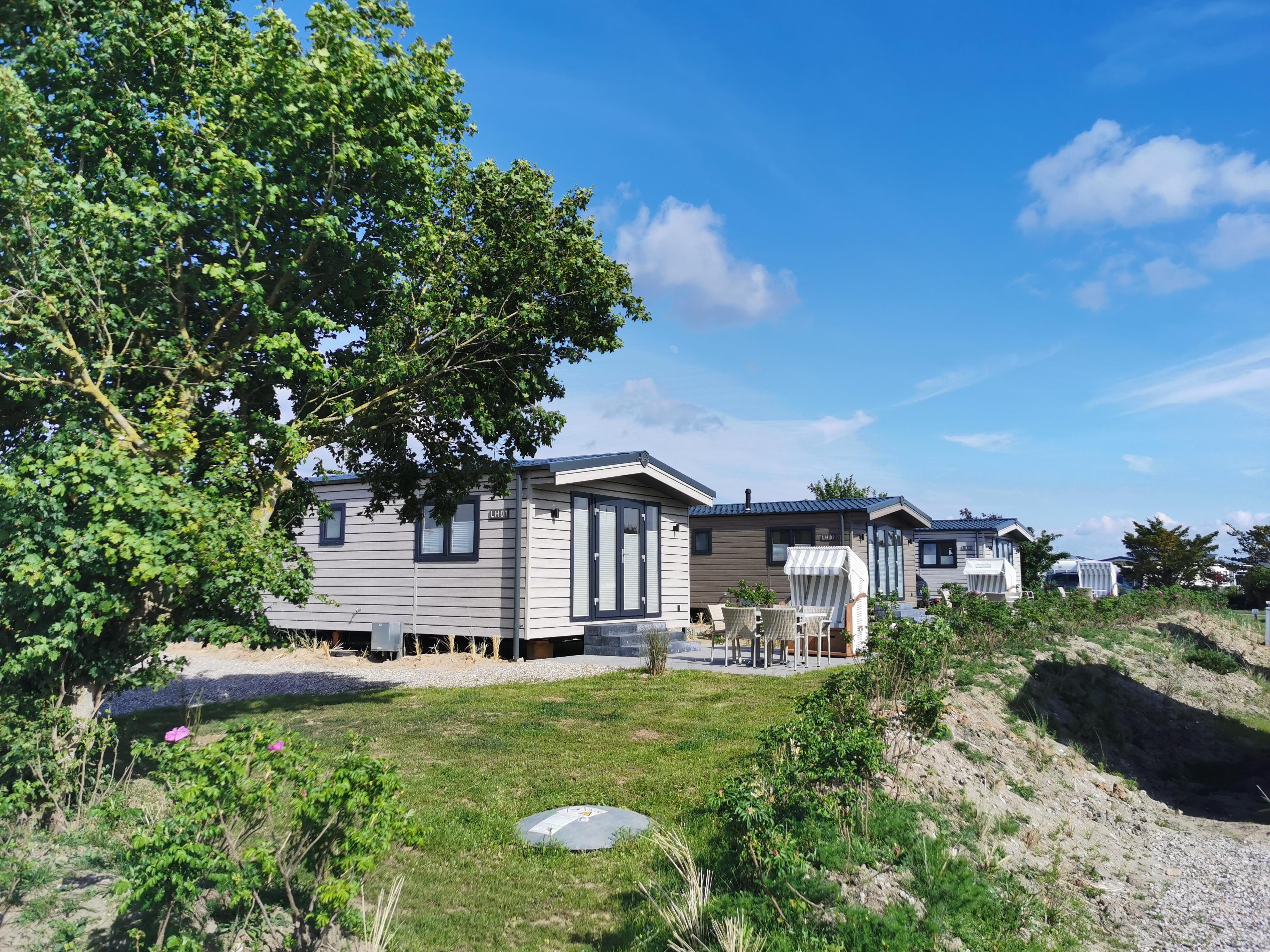 Maison pilote avec jardin partiellement clôturé