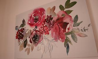 A beautiful watercolor painting featuring red and pink roses along with green leaves. The flowers are painted on a light background.