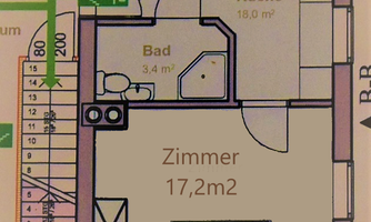 An apartment layout with a total area of 38.6 m². The kitchen has 18 m², the bathroom 3.4 m², and the room measures 17.2 m².