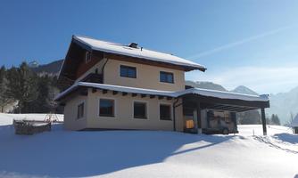 The holiday home Almfrieden in winter.