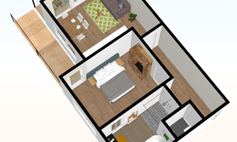 A stylish apartment with a living room, a bedroom, and a bathroom.  
The rooms are modernly furnished and well organized.