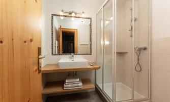 The Planai apartment features a beautiful modern bathroom.