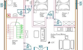 A floor plan of a residential building with various rooms. The plan shows bedrooms, bathrooms, and a balcony.