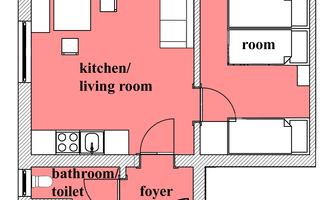 A simple floor plan drawing of an apartment. There is a kitchen/living room, two rooms, a bathroom, and a foyer.