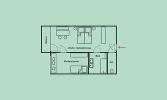 A floor plan of a living space with a separate bedroom, kitchen, and bathroom. The rooms are simply sketched and clearly arranged.