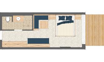 A room layout with a sleeping area, a seating area, and a bathroom. The design is modern and functional.
