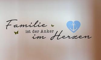 A wall mural with the inscription "Family is the anchor in the heart." It features a blue heart with an anchor and two small butterflies.