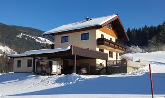 The holiday home Almfrieden in winter.
