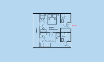 A simple floor plan sketch of an apartment. The rooms consist of two bedrooms, a living room, and a kitchen.