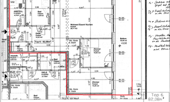 A floor plan of a residential building with various rooms such as living room, bedroom, and bathroom. The markings indicate the dimensions and arrangement of the rooms.