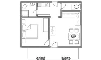 A simple floor plan drawing of an apartment. It shows a bedroom, a bathroom, and a living area with a dining table.