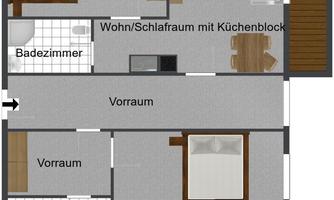 A floor plan of an apartment with two bedrooms, two bathrooms, and a living/sleeping area with a kitchenette. There are two balconies and several entrances.