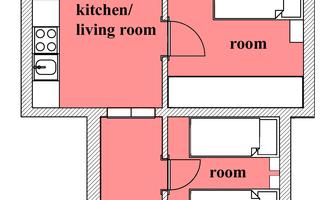 A floor plan of a small house with a living/kitchen area, three additional rooms, and a bathroom. The rooms are clearly separated from each other and well arranged.