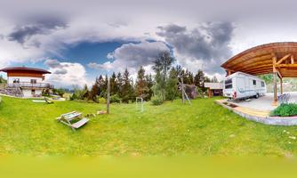 A quiet garden landscape with two huts and a caravan. The sky is overcast, and the surroundings are green and inviting.