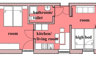 A floor plan of an apartment with different rooms. The main areas are the bathroom, the kitchen/living room, and two bedrooms.