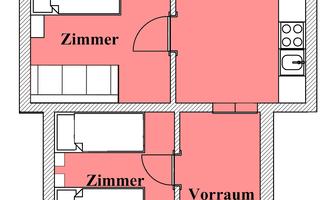 A floor plan of an apartment with several rooms. There is a kitchen, a bathroom/WC, and an entrance hall.