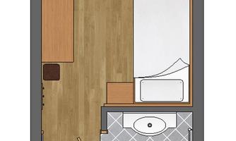 A simple floor plan drawing of a room with furniture. The room includes a bed, a desk, a seating area, and a bathroom.