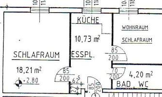 A floor plan of an apartment with different rooms. The main areas are the kitchen, a living room, two bedrooms, and a bathroom.