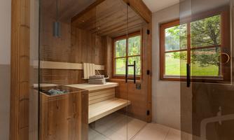 An elegant sauna with wood paneling and large windows. The view overlooks greenery, ideal for relaxing.