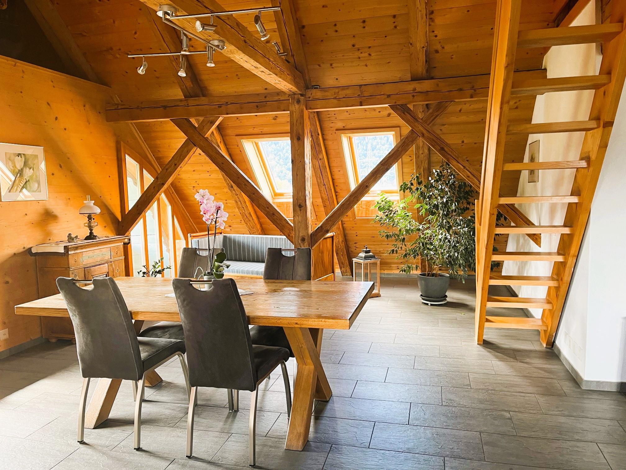 Dining and living Area with Stairs up to the Gallery