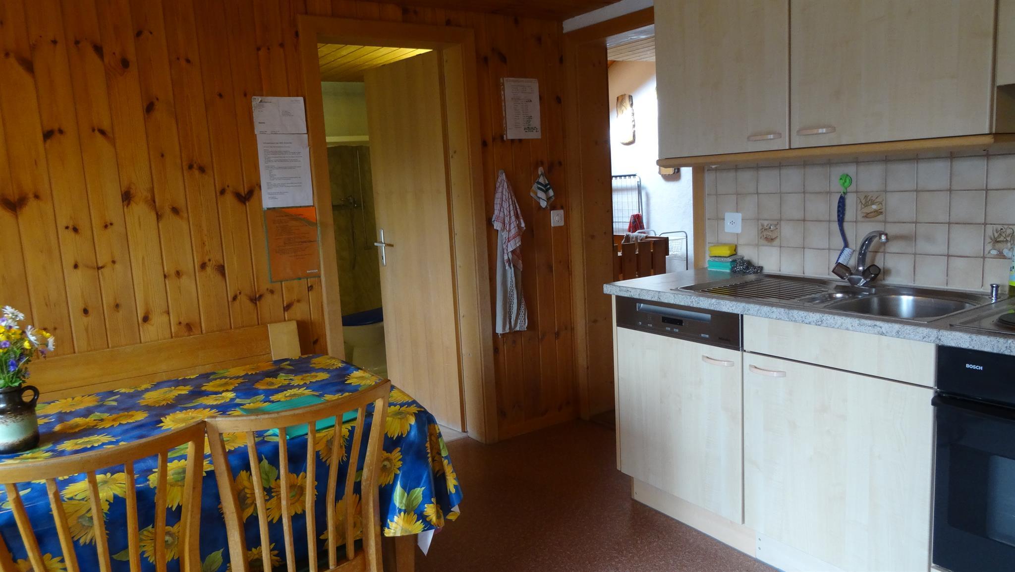 Eingang und Wohnküche Eingang und Wohnküche