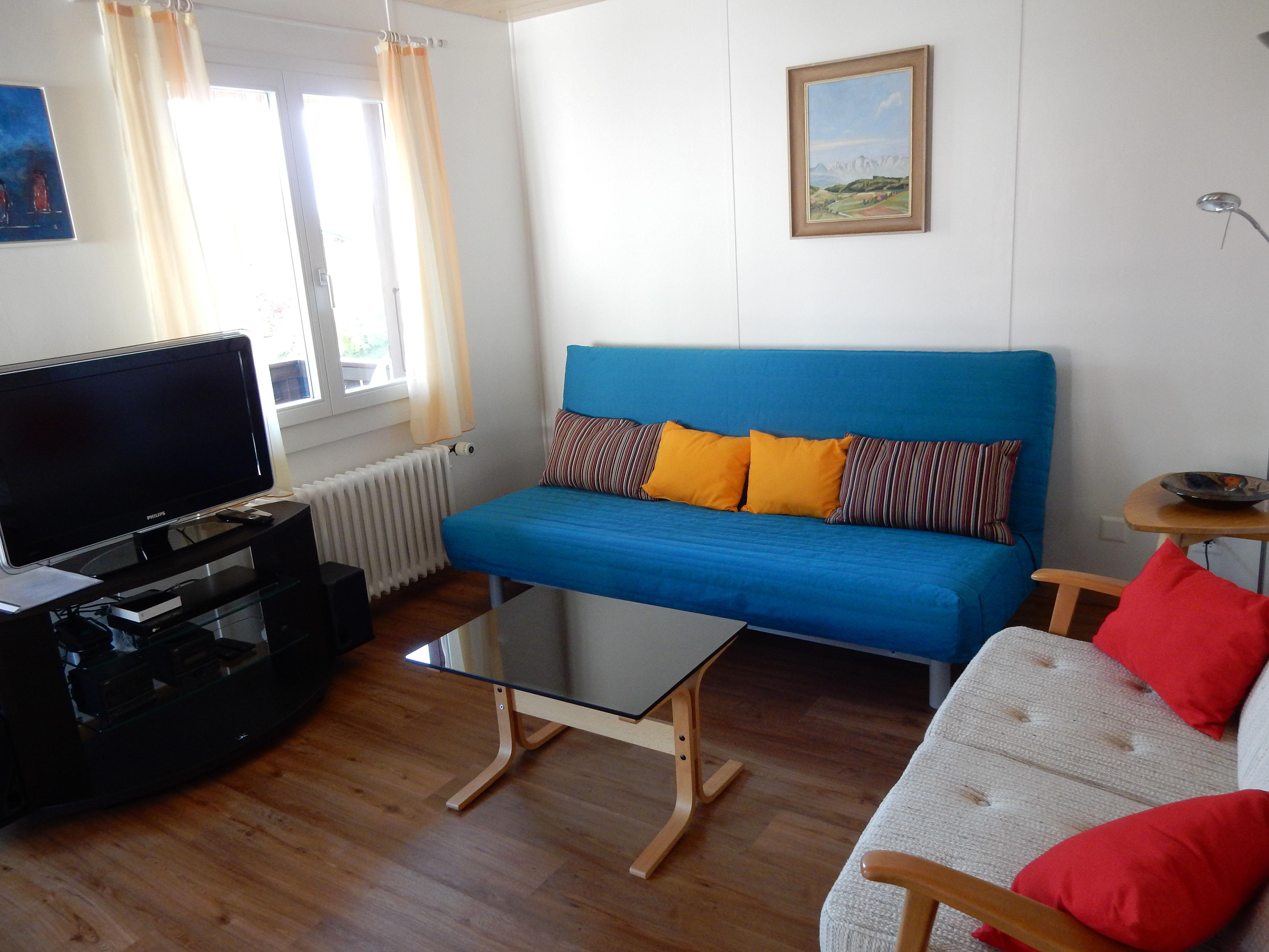 Wohnzimmer mit Zusatzbett Wohnzimmer mit Zusatzbett