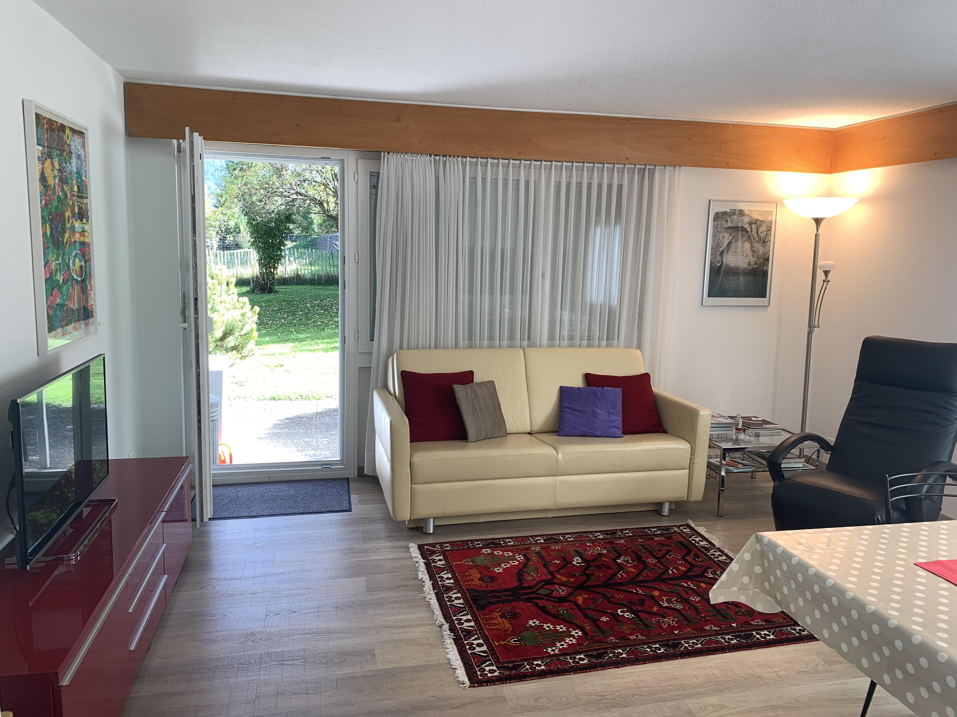 Wohnzimmer mit Sicht zum Parterre Wohnzimmer mit Sicht zum Parterre